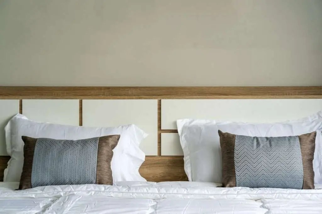 Closeup pillows in Luxury Interior bedroom, service apartment and Accommodations Concept